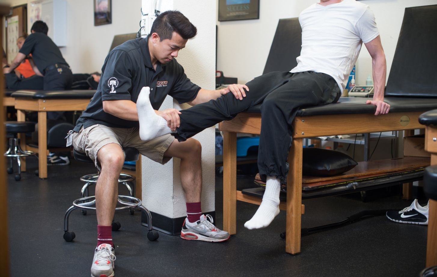Trainer working with athlete